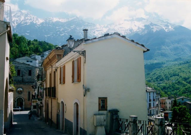 Castelli town with mountain by roo Bekeris 1998